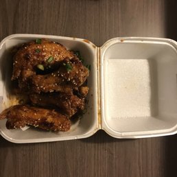 chicken wings in a styrofoam container chicken wings in a styrofoam container