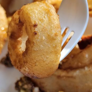 Richee Freeze - A fork and onion ring. - Burgers Near Me - Roanoke, Virginia
