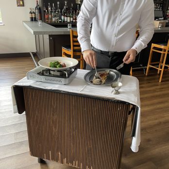 Castello Restaurant - Filleting branzino tableside - Italian Near Me - Danbury, Connecticut Castello Restaurant - Filleting branzino tableside - Italian Near Me - Danbury, Connecticut