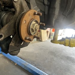 Tonys Touch Auto Repair and Customs - Fixing my issue of where a lug nut snapped off.