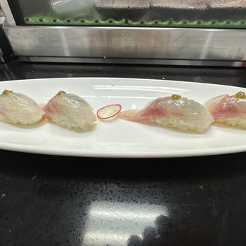 Oroshi Sushi - Black Snapper nigiri with yuzu and shiso leaf - Japanese Near Me - Valley Glen, California Oroshi Sushi - Black Snapper nigiri with yuzu and shiso leaf - Japanese Near Me - Valley Glen, California