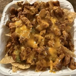 Chicken asado nachos.  Why use AI pictures on the menu when the food looks this good?