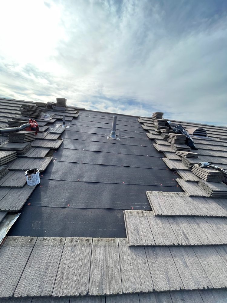 Slide of Roof Pros Rancho