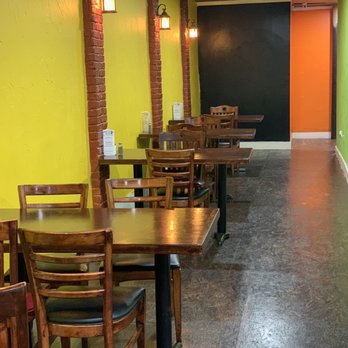 Beto’s Tacos  -  tables and chairs in a restaurant - Tacos Near Me - Worcester, Massachusetts