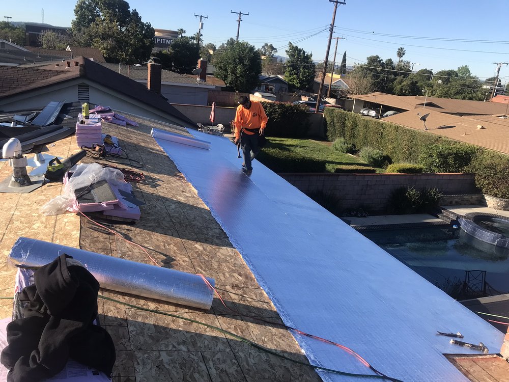 Slide of MA Roofing and Gutters