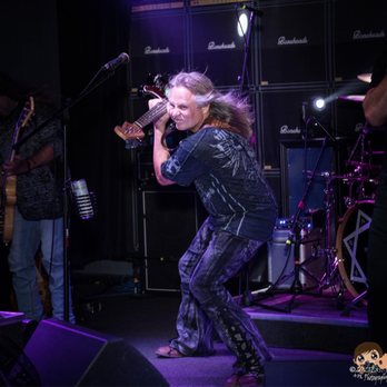 Field House Pub - a man on stage with a guitar - Bars Near Me - East Providence, Rhode Island