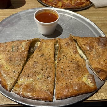 5th Street Pizza - Italian sausage and mushroom calzone. - Pizza Near Me - Allen, Texas 5th Street Pizza - Italian sausage and mushroom calzone. - Pizza Near Me - Allen, Texas