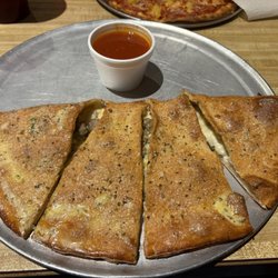 5th Street Pizza - Italian sausage and mushroom calzone.