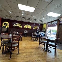 Los Poblanos - The main restaurant area, showing the hostess counter with Michele standing ready to seat you as you walk in.