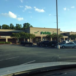 a view of a parking lot from inside a car