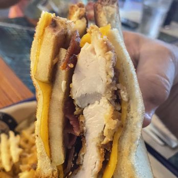 Treylor Park - Side view Grilled Apple Pie Sandwich with chicken - New American Near Me - Savannah, Georgia