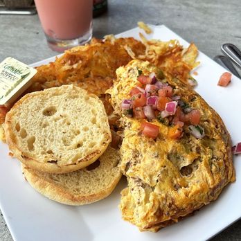 Scramble, a breakfast & lunch joint - The Phoenix Omelette with a coconut cocktail - Breakfast & Brunch Near Me - Tempe, Arizona Scramble, a breakfast & lunch joint - The Phoenix Omelette with a coconut cocktail - Breakfast & Brunch Near Me - Tempe, Arizona