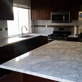 Eltiste Company - a kitchen with marble countertops - General Contractors Near Me Eltiste Company - a kitchen with marble countertops - General Contractors Near Me
