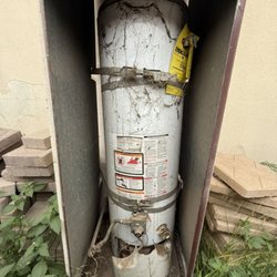 Primo Plumbing & Heating - An old water heater that's ready for replacement!
