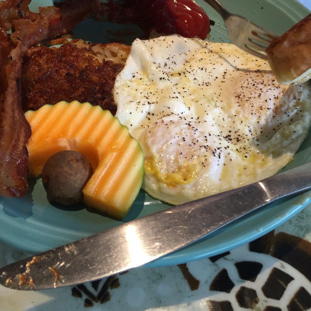 Pele's Kitchen - Two eggs breakfast with bacon & hash brown with grilled sour dough grilled toast. - Breakfast & Brunch Near Me - Pahoa, Hawaii Pele's Kitchen - Two eggs breakfast with bacon & hash brown with grilled sour dough grilled toast. - Breakfast & Brunch Near Me - Pahoa, Hawaii