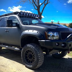 One Way Custom Paint & Collision - 2007 Chevy Tahoe, custom "Raptor" paint and many custom body projects.