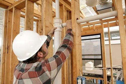 National Economy Plumbers Logo