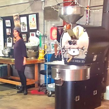 Repetition Coffee - a woman standing in a coffee shop - Coffee Roasteries Near Me - Lawrence, Kansas Repetition Coffee - a woman standing in a coffee shop - Coffee Roasteries Near Me - Lawrence, Kansas