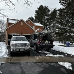 Atlantic Home Improvements Corp - Some of our roofers taking care of an emergency call in the heavy snow