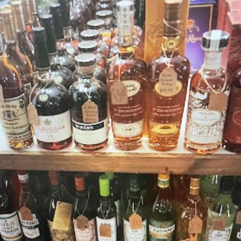 Tricks Of The Trade - a shelf full of liquor bottles - Beer, Wine & Spirits Near Me - Fort Worth, Texas Tricks Of The Trade - a shelf full of liquor bottles - Beer, Wine & Spirits Near Me - Fort Worth, Texas