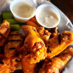 Pines Bar and Grill - Traditional house wings, sweet & spicy and grilled finish.