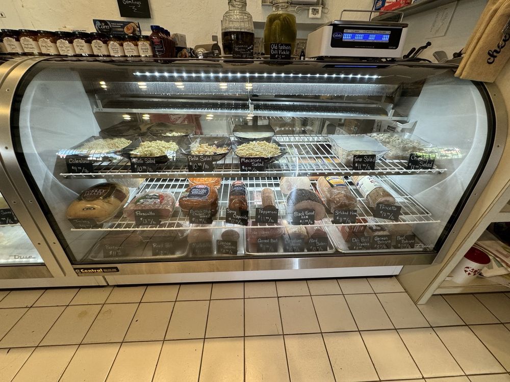 Jump up Deli & Dem Tings Logo