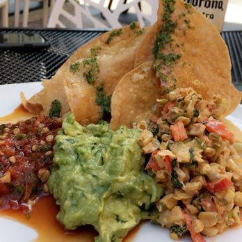 Salsa's - Chips, guacamole and two different salsas (one is smoked tomato I think)! - Mexican Near Me - Asheville, North Carolina