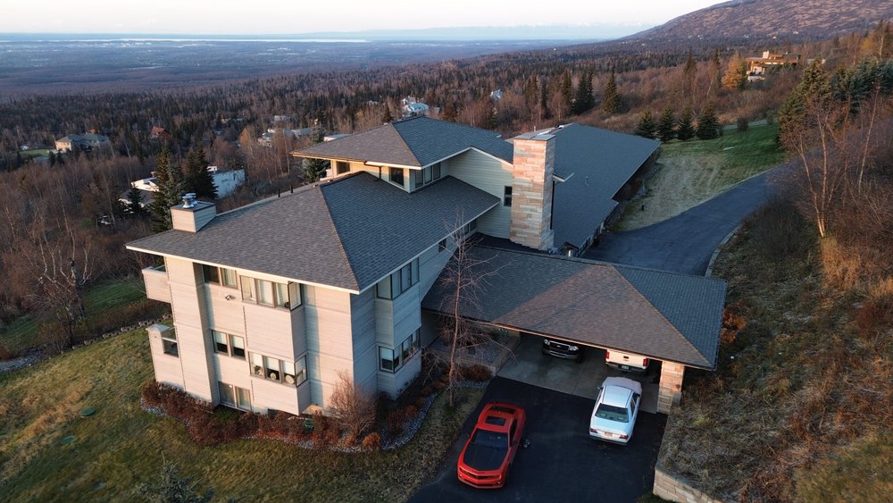 Slide of Reds Roofing & Renovations