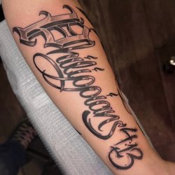 Oddity Tattoo - Fineline script tattoo done at Oddity Tattoo Sarasota FL