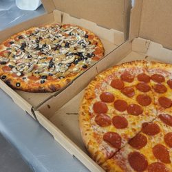 New York Pizza & Wings - Pepperoni Pizza and it's cousin, the Supreme, with pepperoni, sausage, onions, bell peppers and mushrooms. All veggies are fresh cut daily.