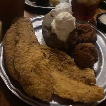 Patti's 1880's Settlement - Catfish dinner with baked potato tons of sour cream and butter Huge hush puppies homemade tartar and ranch - American Near Me - Grand Rivers, Kentucky