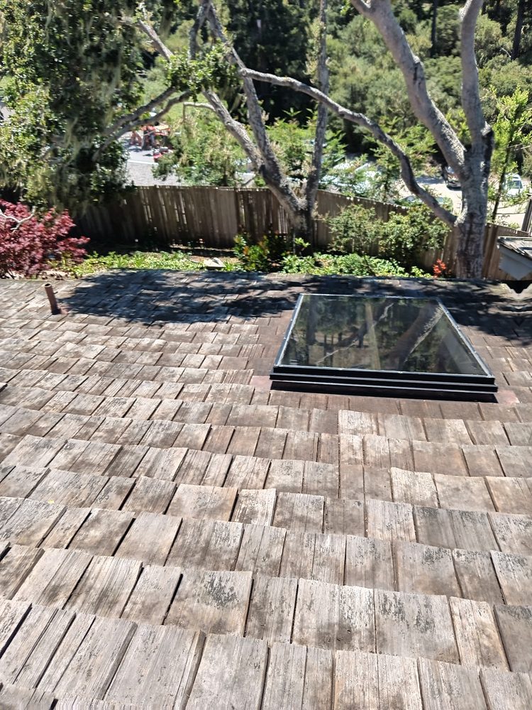 Slide of Rick's Roof & Gutter Cleaning Service