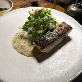 Urban Hearth - Dry aged striped bass in tarragon lime butter - New American Near Me - Cambridge, Massachusetts