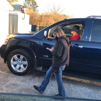 Ruth's Drive In - Employee attends to patrons in their cars, takes orders, delivers food, accepts payment and off she goes! - Burgers Near Me - Hartsville, South Carolina