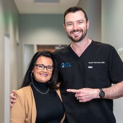 ATL Dental Implants - Dr. Holcomb & Patient