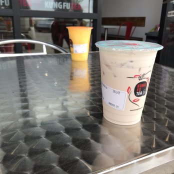 Kung Fu Tea - Orange tea with mango bursts and coconut milk tea - Coffee & Tea Near Me - Richmond, Texas