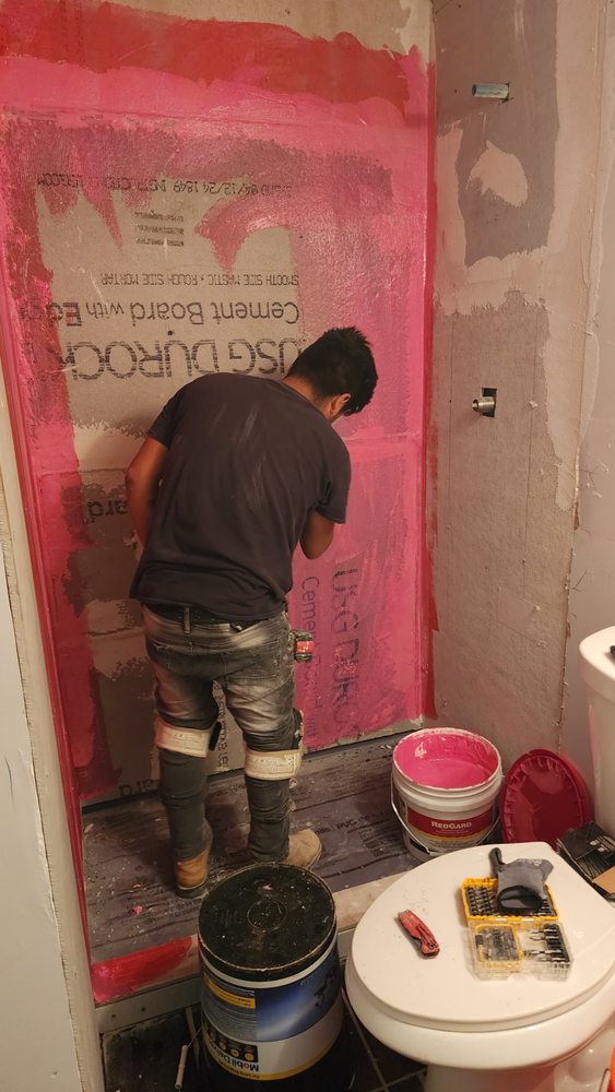 Slide of JS Roofing Group