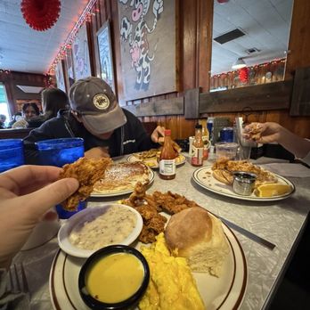 Home Grown - Chicken finger plate with a biscuit and sausage gravy, and a side of scrambled eggs with cheese - Diners Near Me - Atlanta, Georgia