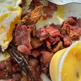 Neros Waterfront Cafe - Greasy gross corn beef hash with burnt eggs - Breakfast & Brunch Near Me - St. Augustine, Florida