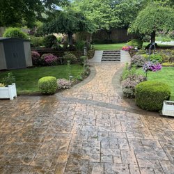 Liberty Concrete - Stamped patio with stamped ribbons