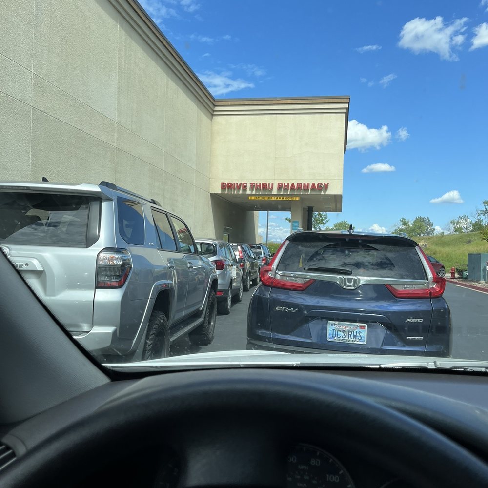 a view of a parking lot from inside a car a view of a parking lot from inside a car