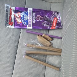 OMG Food Mart - Messed up hemp wrap out the wrapper.  The plastic wrap that goes around the individual wraps is some how stuck in the seal of the package.