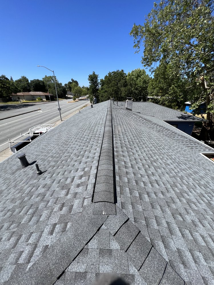 Slide of E Sanchez roofing