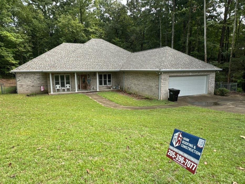 Slide of HHM Roofing & Construction