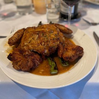Rosebud Steakhouse - Munster - This is what the brick chicken looked like two years ago. Big and juicy and served with asparagus spears. - Steakhouses Near Me - Munster, Indiana Rosebud Steakhouse - Munster - This is what the brick chicken looked like two years ago. Big and juicy and served with asparagus spears. - Steakhouses Near Me - Munster, Indiana