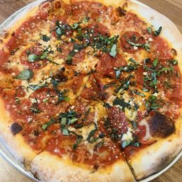 Pepperoni pizza with basil Pepperoni pizza with basil
