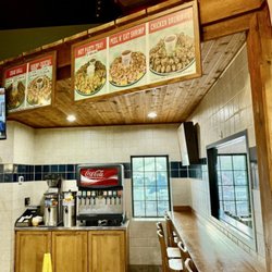 Pig Picker's Memphis Style Bar B Que - Counter seating and dine-in beverages