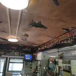 Cool model airplanes and helicopters hung from the ceiling everywhere. Cool model airplanes and helicopters hung from the ceiling everywhere.