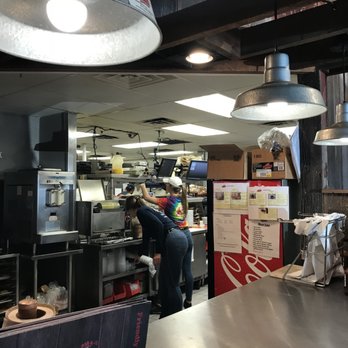 Mark's Feed Store - Busy at work - in plain view. - Barbeque Near Me - New Albany, Indiana