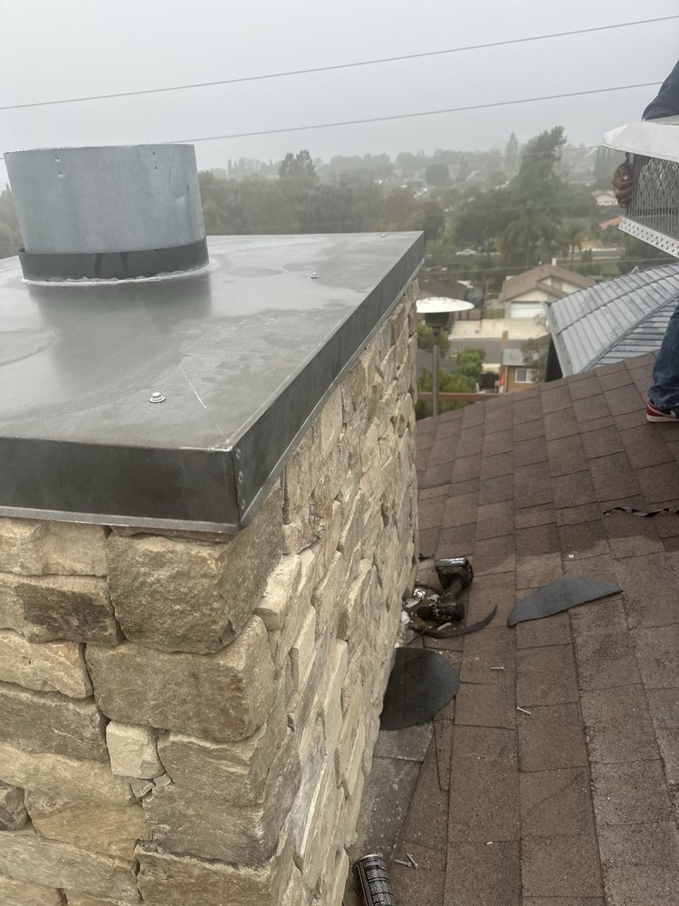 Slide of T’s Roofing 